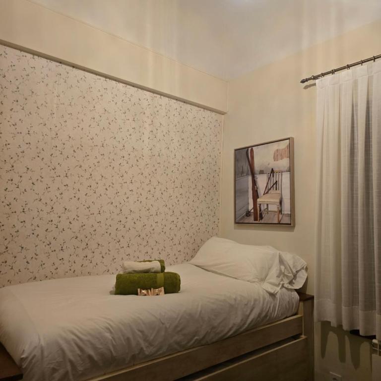 Un encanto de dúplex - Three-Bedroom Apartment - 35