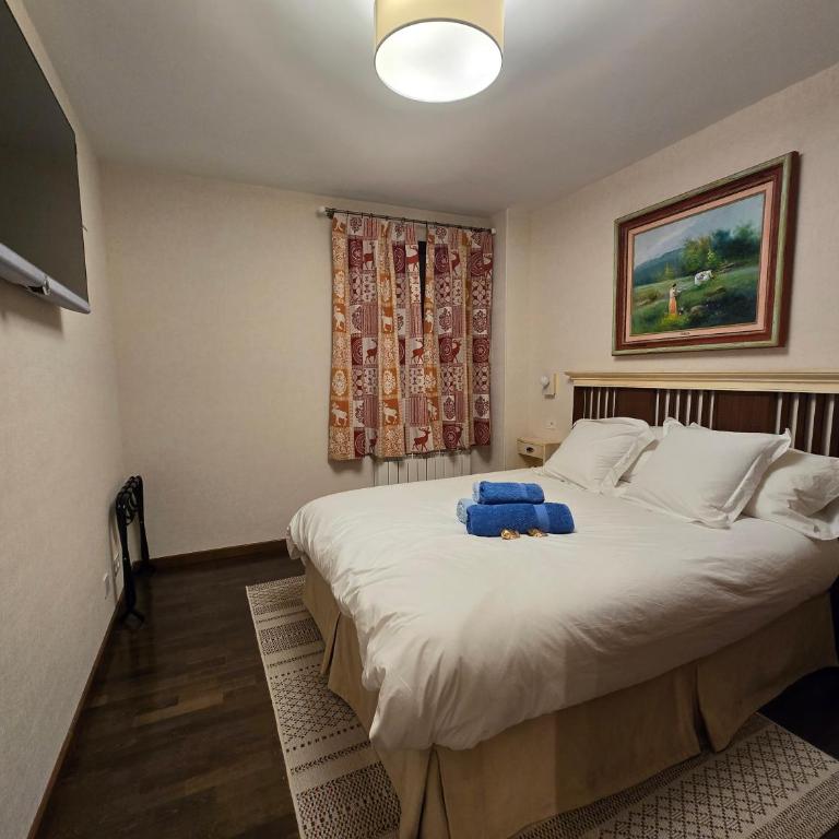 Un encanto de dúplex - Three-Bedroom Apartment - 28
