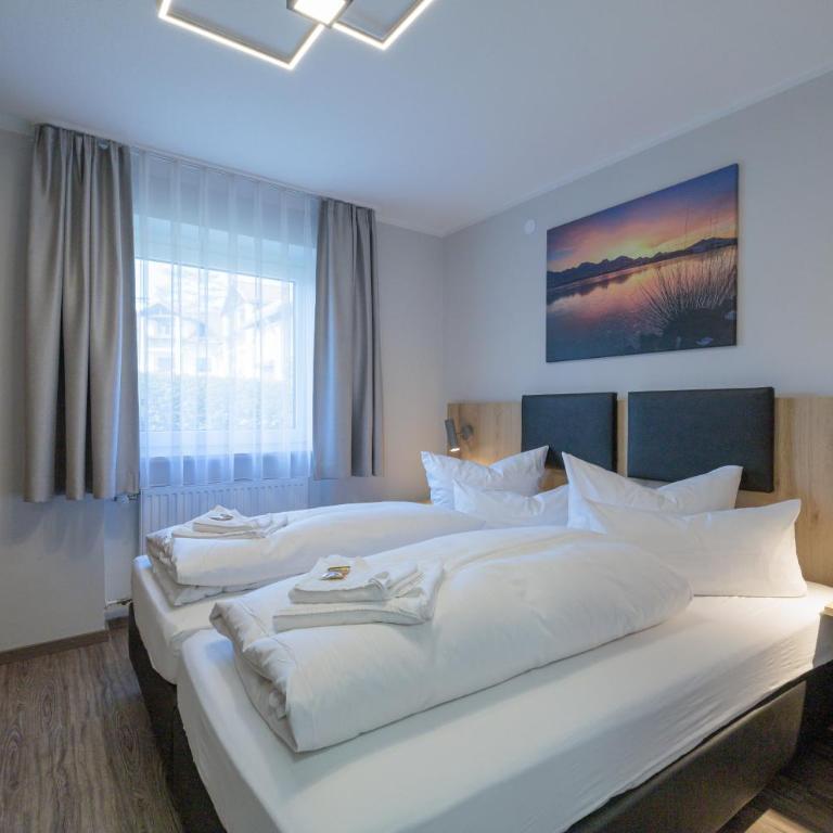 Gästehaus Köpf - Superior Ferienwohnung mit Balkon oder Terrasse zur Südseite - 11