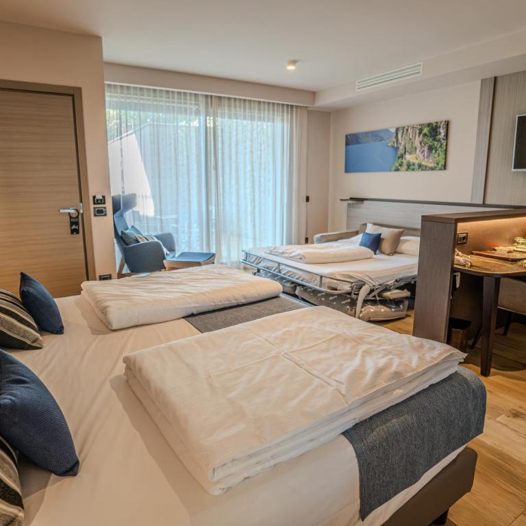 Villa Remo by Hotel Galvani - Kleines Doppelzimmer mit Balkon und eingeschränktem Seeblick - 5