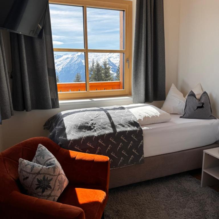 GLOCKNERALM - HIKING- and SKIHOTEL exklusively accessible by cable car - Einzelzimmer mit Bergblick - 1