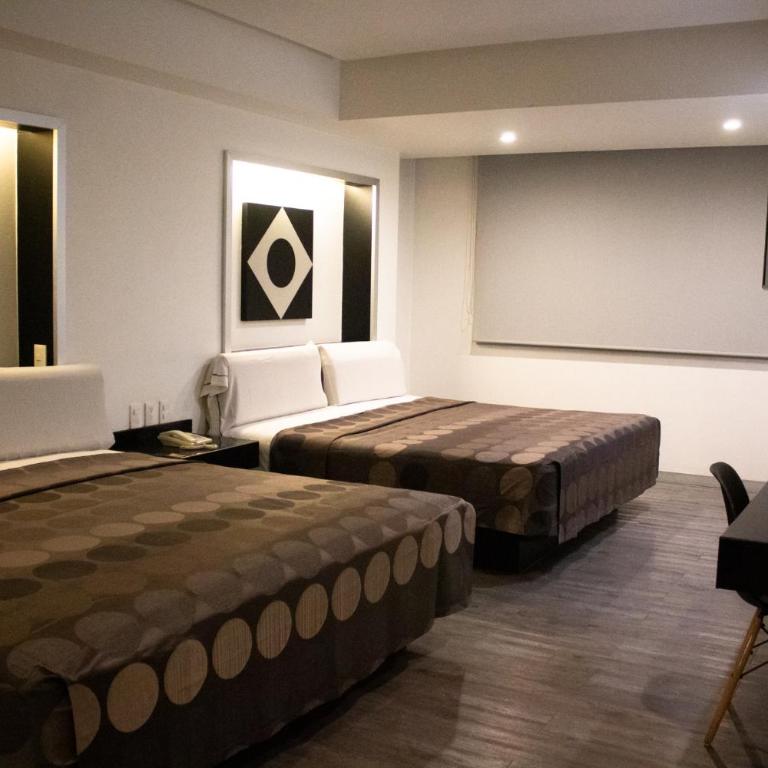 Hotel Harare - Habitación Doble - 2 camas dobles - 9