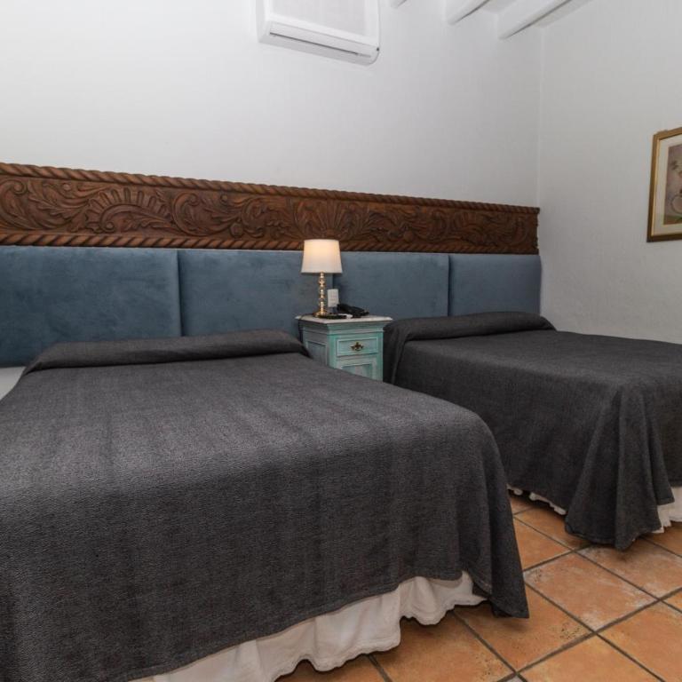 Hotel Boutique Naura Centro - Habitación Doble Estándar con 2 camas dobles - 1