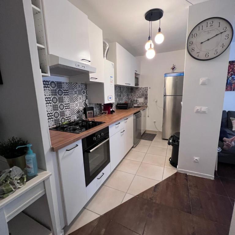 Appt à 10 min de Paris, 15 min a pied du SDF - Apartamento de 3 dormitorios - 16