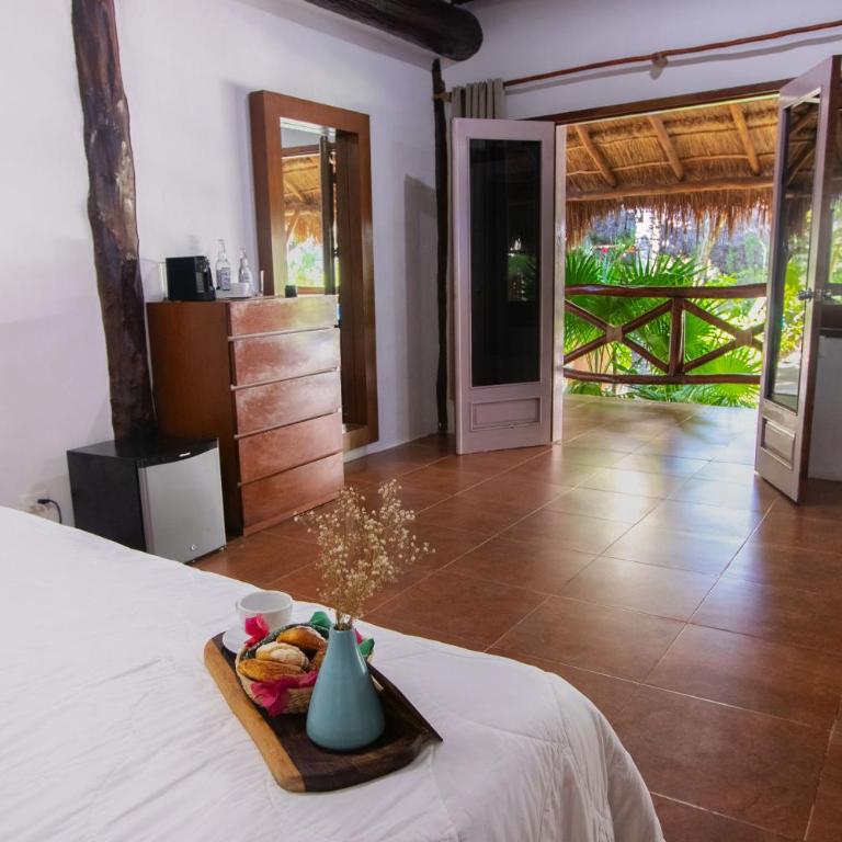 Hotel Las Nubes Holbox - Suite Junior con vistas al jardín - 1
