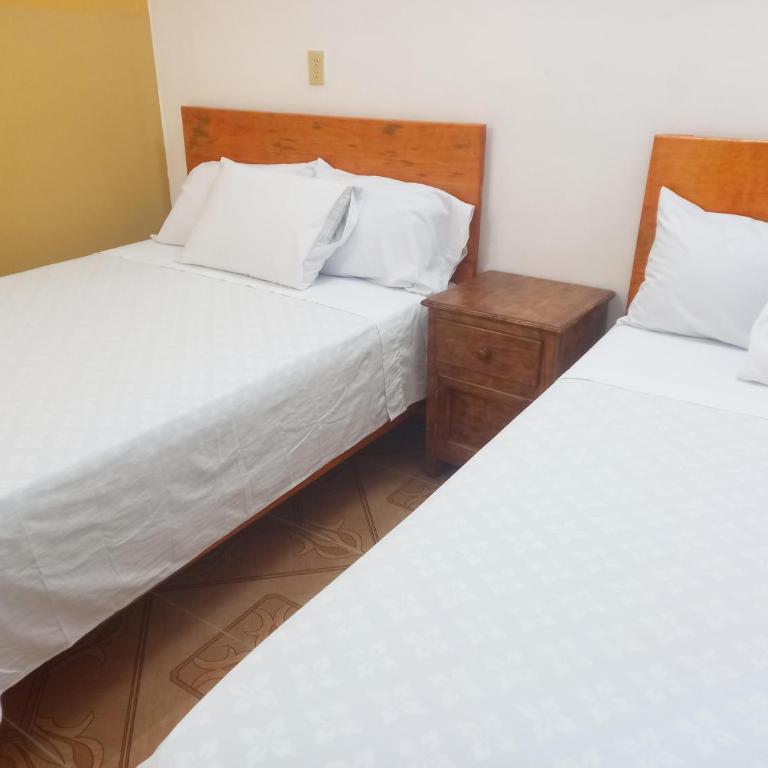 Hospedaje casa Yuca - Habitación Doble Estándar con 2 camas dobles - 32