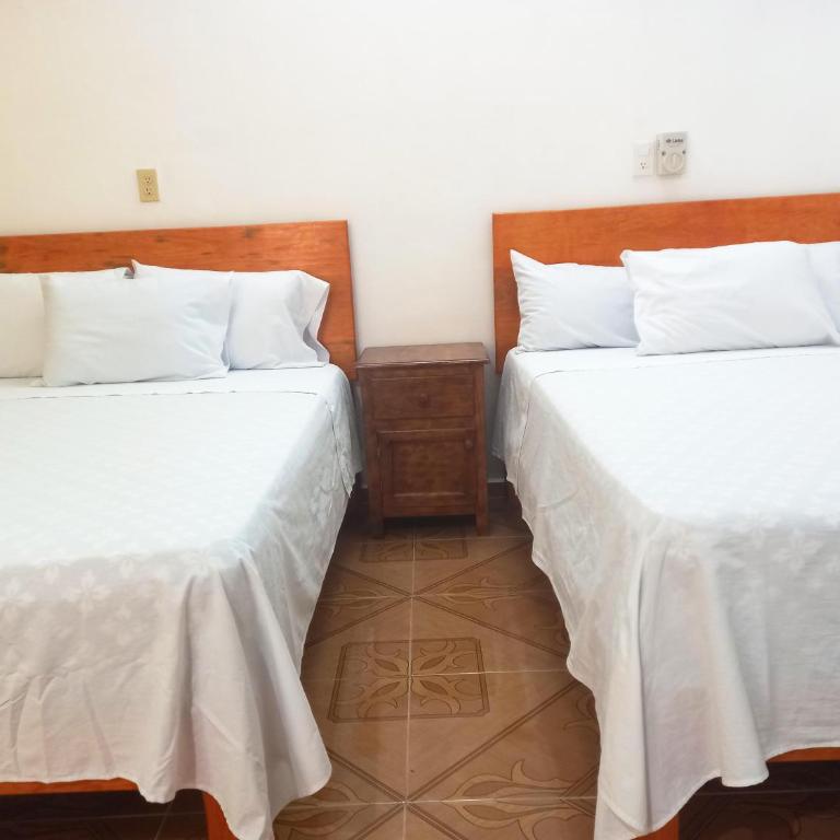 Hospedaje casa Yuca - Habitación Doble Estándar con 2 camas dobles - 1