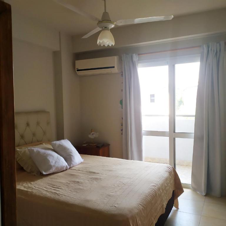 Alquiler Temporario Tucumán Con Cochera Y Pileta - Apartamento de 1 Dormitorio con balcón y vistas a la ciudad - 1