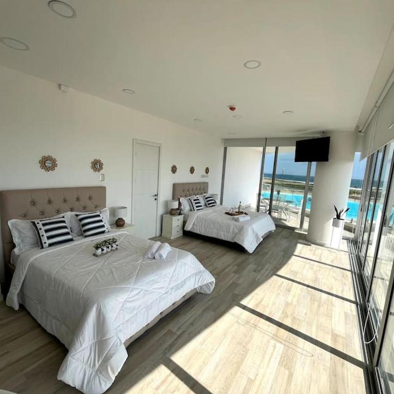 Ecusuites Karibao Resort Town & Family - Villa - Beach Front - 11