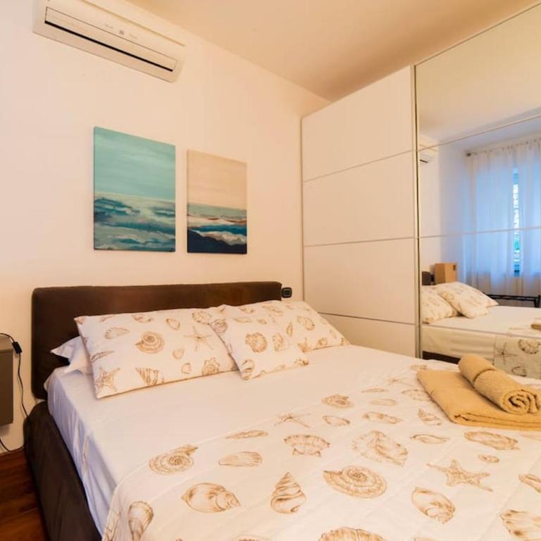 Trilocale sulla Spiaggia - Parcheggio Privato - Appartamento con 2 Camere da Letto - 3