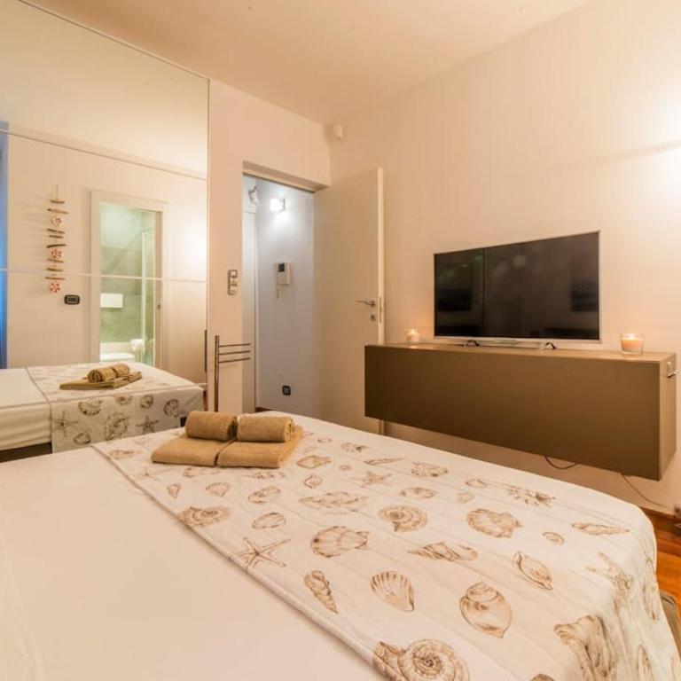Trilocale sulla Spiaggia - Parcheggio Privato - Appartamento con 2 Camere da Letto - 24