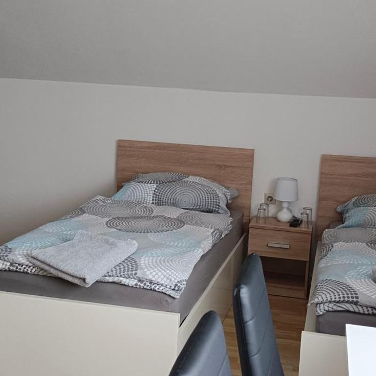 Ring Gästehaus - Doppelzimmer mit eigenem externen Bad - 11