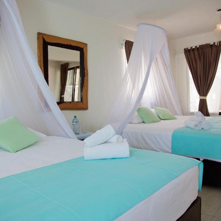 Punta Piedra Beach Posada - Habitación Doble Real con vistas al mar - 2 camas dobles - 6