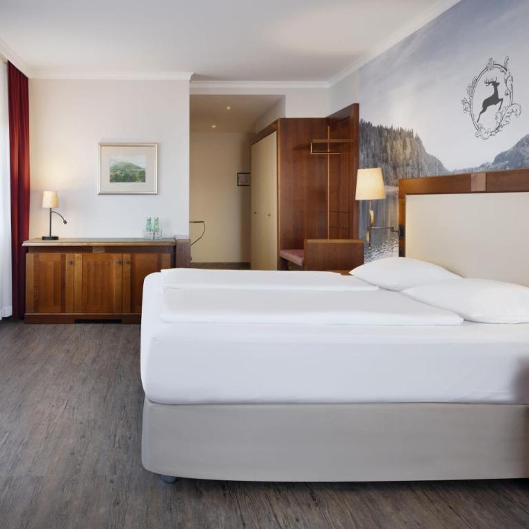Arabella Jagdhof Resort am Fuschlsee, a Tribute Portfolio Hotel - Deluxe Zimmer mit Kingsize-Bett und Gartenblick - 1