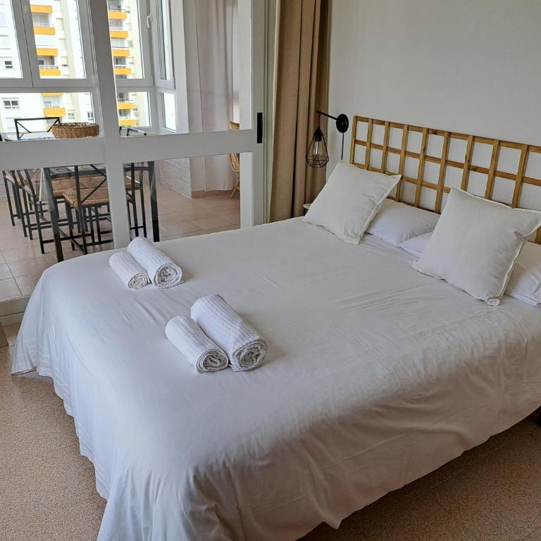 Ático primera línea de playa con vistas al Mar-Climatizado-Wifi-Parking-Solo familias - Apartamento de 3 dormitorios - 9