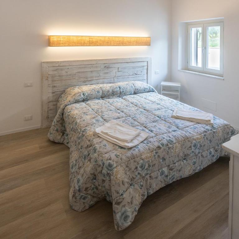 Lombardi Rita - Colle S. Martino - Appartamento con 2 Camere da Letto e Patio - Su 2 Livelli - 45