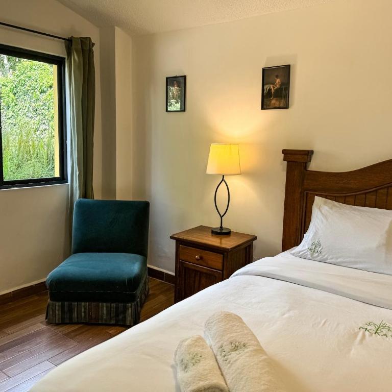 Mckay's Quinta - Habitación con cama grande y vistas al jardín - 9