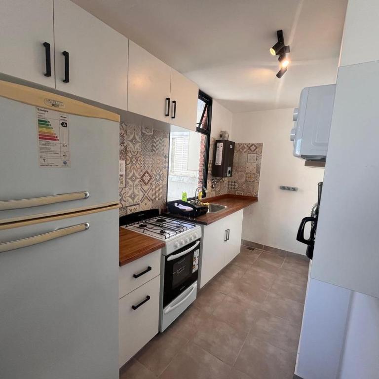 Hermoso departamento 2 dormitorios con cochera - Two-Bedroom Apartment - 4