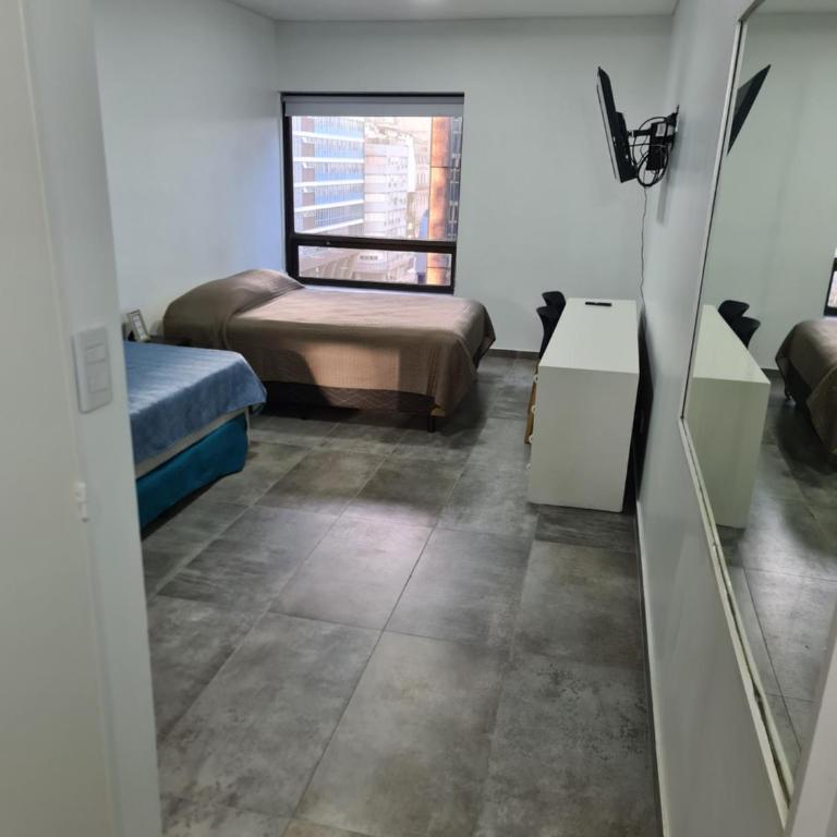 Av. Corrientes 818/820, Ciudad de Buenos Aires - Apartamento de 1 dormitorio - 27