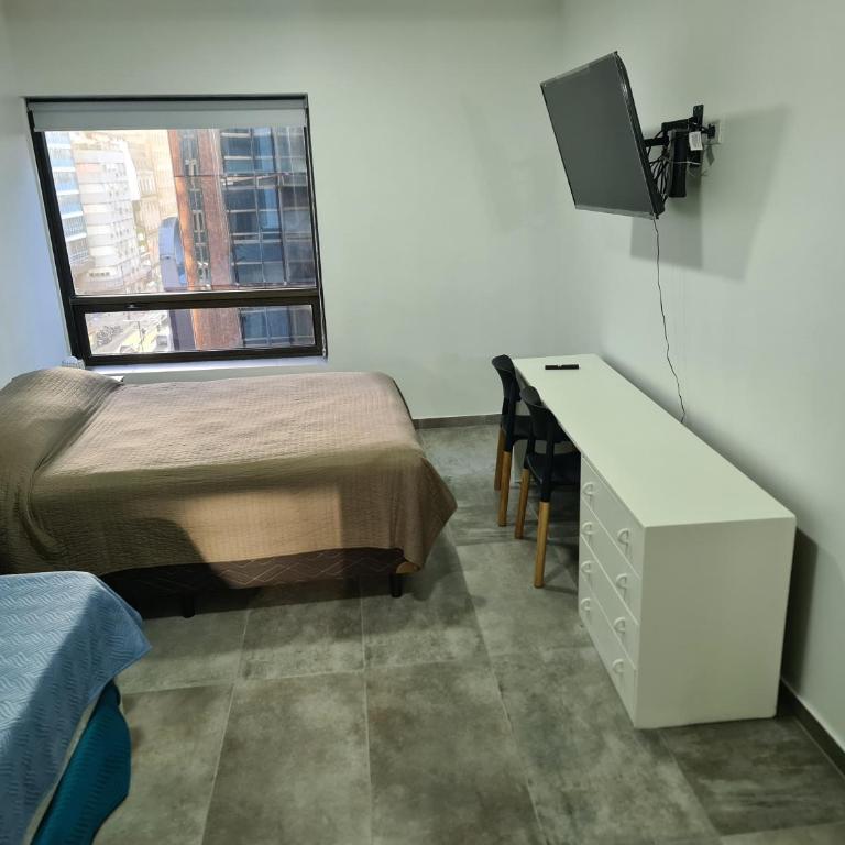 Av. Corrientes 818/820, Ciudad de Buenos Aires - Apartamento de 1 dormitorio - 26