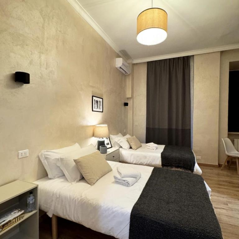 Ten Miles Guesthouse Roma - Camera Doppia con Letti Singoli con Bagno Privato - 1
