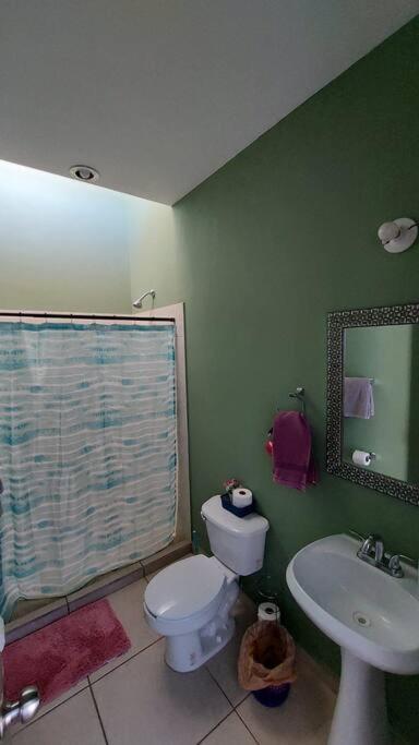 House 5 min by the beach, with wide open garage. - Three-Bedroom House - 18