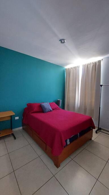House 5 min by the beach, with wide open garage. - Three-Bedroom House - 25