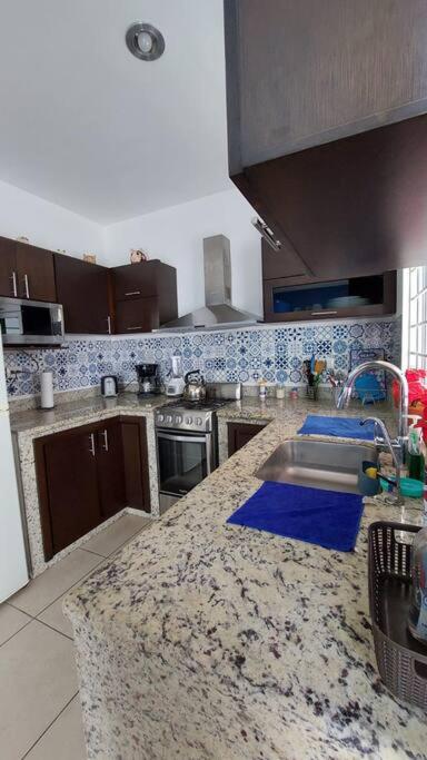 House 5 min by the beach, with wide open garage. - Three-Bedroom House - 30