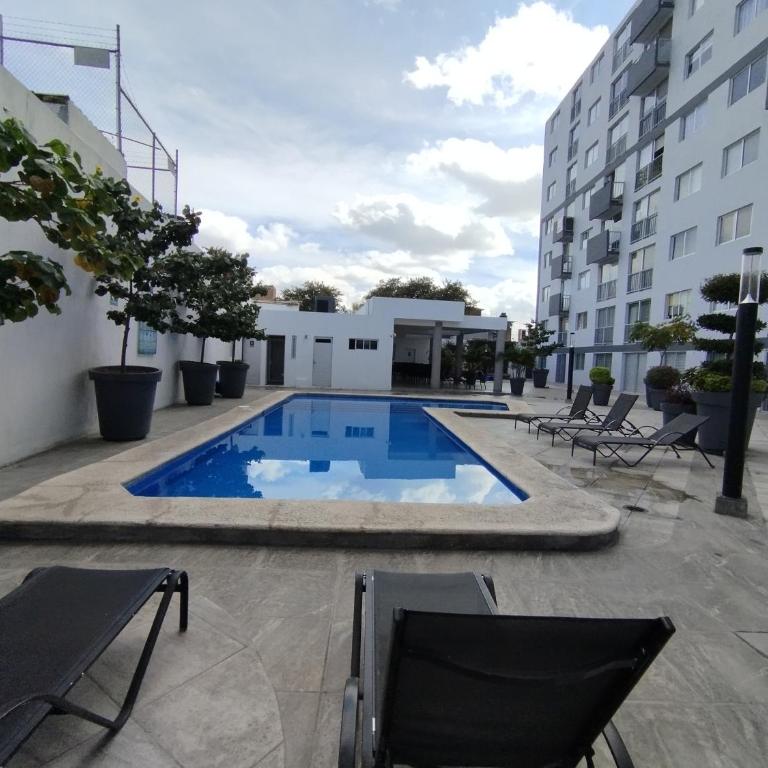 Céntrico y estiloso apartamento con Alberca, AC, Seguridad, Aparcamiento y Gym - Two-Bedroom Apartment - 23