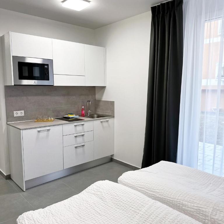 Grazora Living Apartments - Deluxe Doppelzimmer mit Balkon - 8