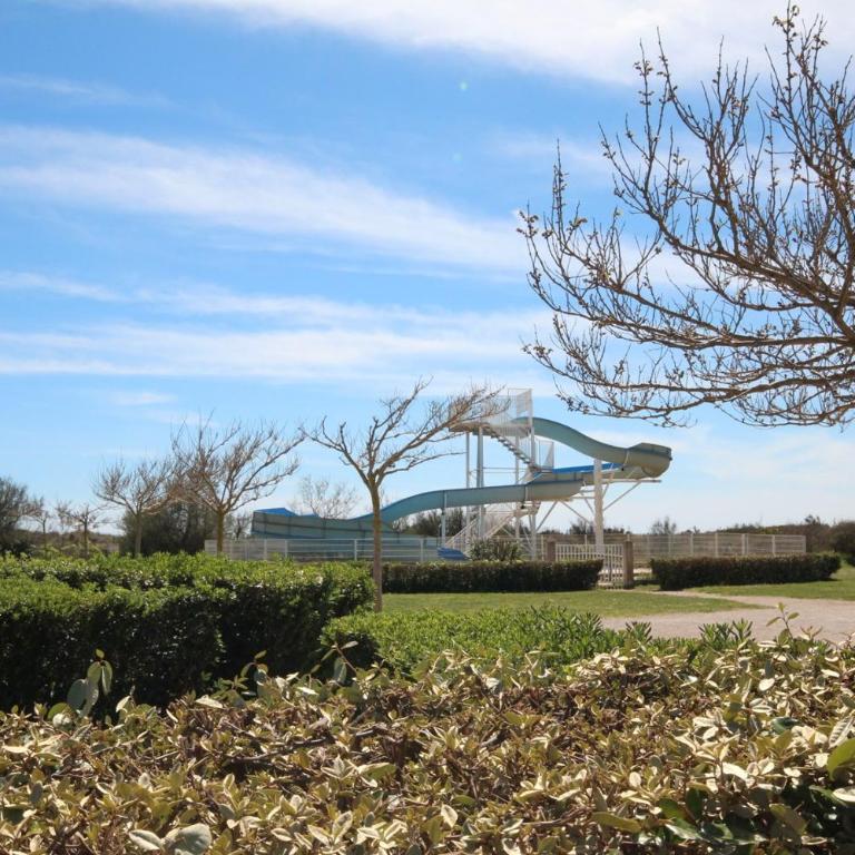 Belle villa entièrement climatisée 4 chambres 10 couchages, fibre WIFI, 2 terrasses parking privatif dans résidence sécurisée piscine commune 800 m de la mer LRCS69 - Haus mit 4 Schlafzimmern - 29