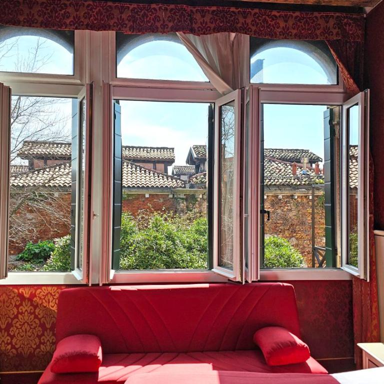 Ca' Messner 5 Leoni - Deluxe Vierbettzimmer mit Gartenblick - 3
