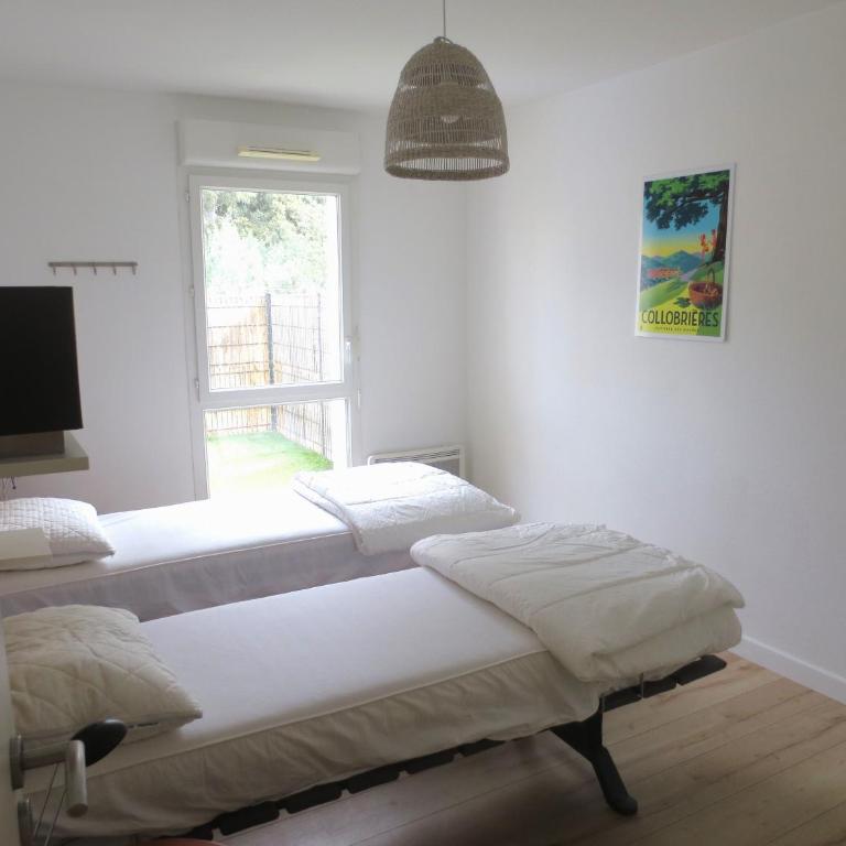 Rez de Jardin T3 recent et calme au Nouvelles Terres à La Londe les Maures - Appartement 2 Chambres - 21