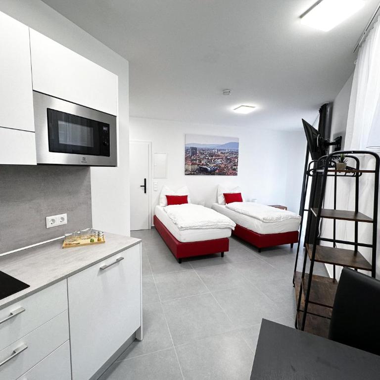 Grazora Living Apartments - Deluxe Zweibettzimmer - 2