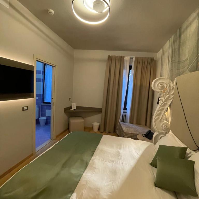 Hotel Central Giacomini - Camera Deluxe (2 Adulti + 1 Bambino) - 9