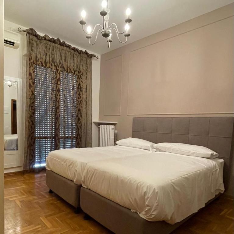 Residenza Sandrini - Camera Matrimoniale/Doppia con Letti Singoli con Bagno Privato - 1