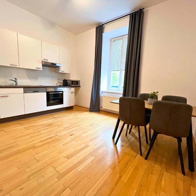 Leoben City Apartments - Premium Apartments 24 7 - Camera Doppia con Letti Singoli con Vista Giardino - 3