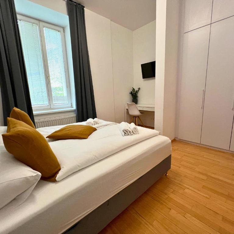Leoben City Apartments - Premium Apartments 24 7 - Camera Doppia con Letti Singoli con Vista Giardino - 8