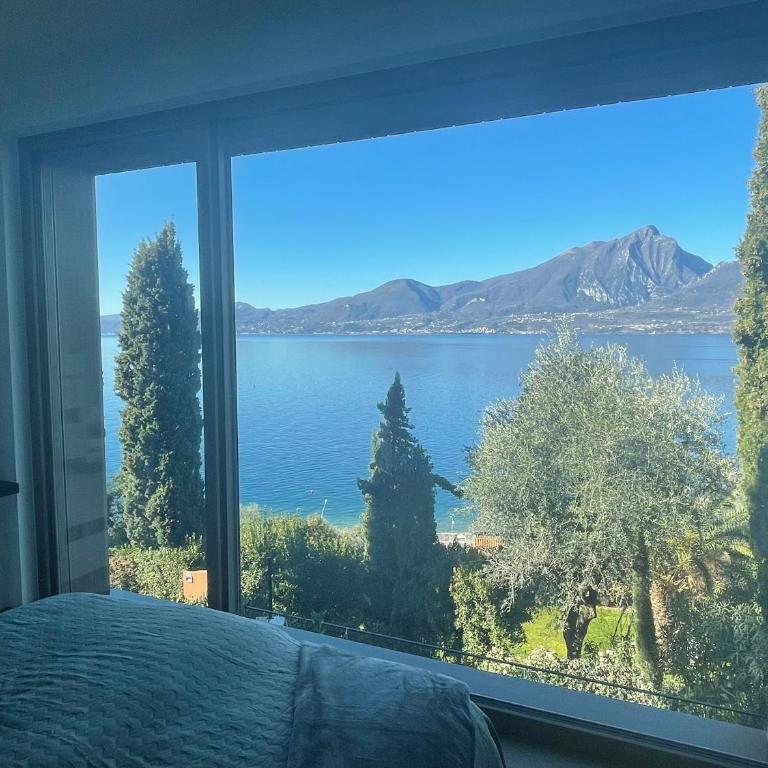 3 Zimmer Apartment am Gardasee mit traumhaften Seeblick und Pool in Torri del Benaco - Appartamento - 1
