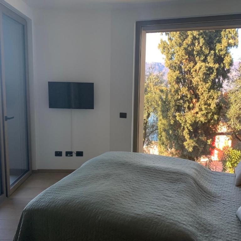 3 Zimmer Apartment am Gardasee mit traumhaften Seeblick und Pool in Torri del Benaco - Appartamento - 11