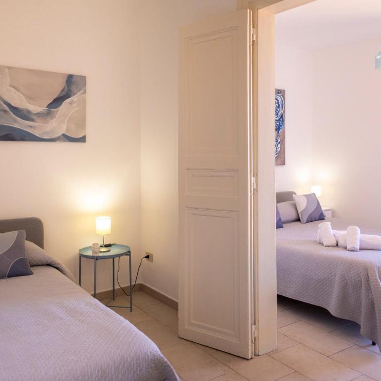 Dolce Vita Rooms and Apartments - Camera Tripla Superior - 9