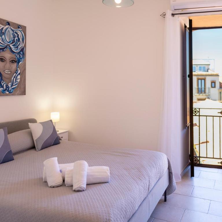 Dolce Vita Rooms and Apartments - Camera Tripla Superior - 1