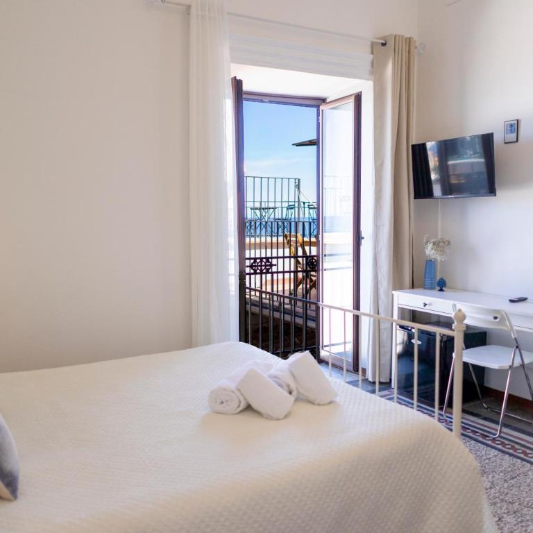 Dolce Vita Rooms and Apartments - Camera Tripla con Vista Mare - 12