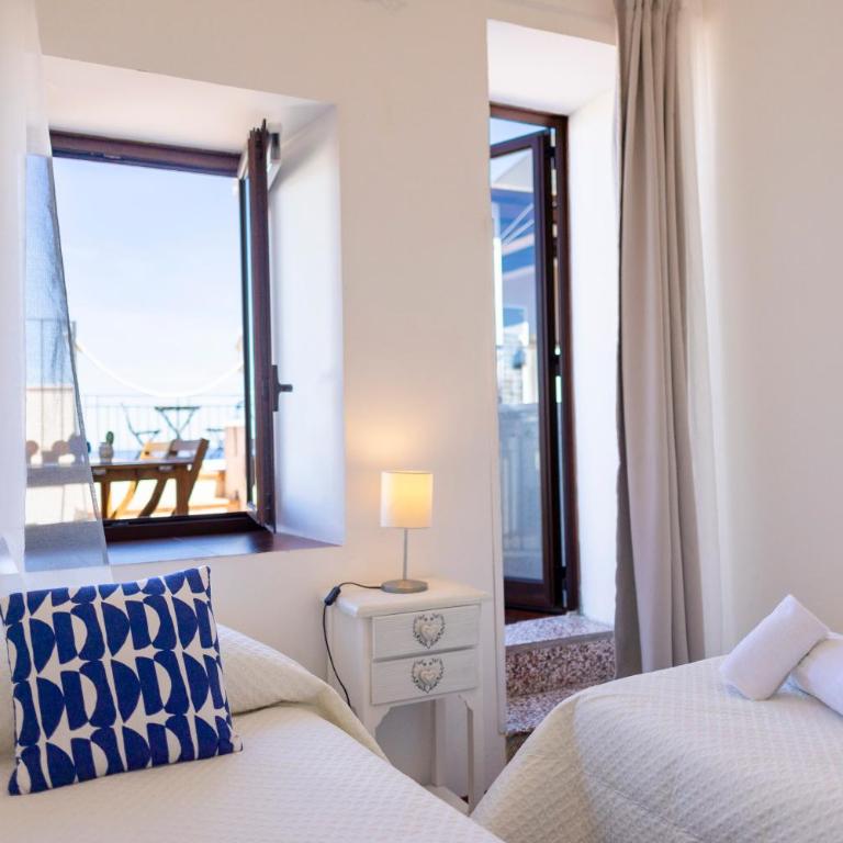 Dolce Vita Rooms and Apartments - Camera Tripla con Vista Mare - 11