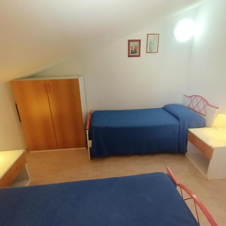 Appartamenti Villa Chiara - Appartamento su 2 Livelli con 2 Camere da Letto e Terrazza (6 Adulti) - Strada Comunale Poggi 121 - 10
