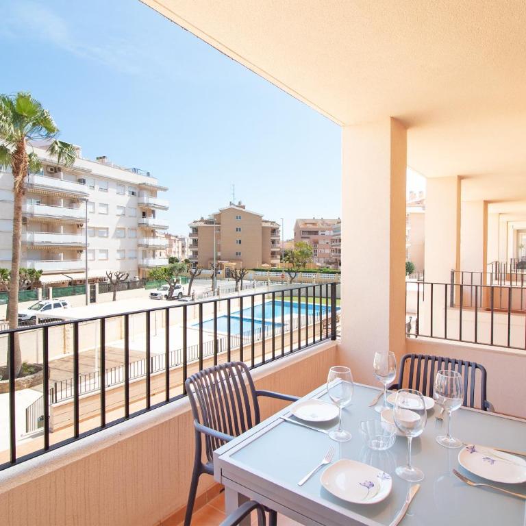 Global Vacacional, Apartamento con piscina y terraza en la playa de Canet - Apartment - 1
