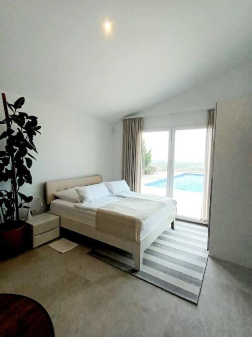 Casita "Zoo" con vistas al mar, al castillo de Denia, al Montgo y piscina comunitaria - Apartamento de 1 dormitorio - 6