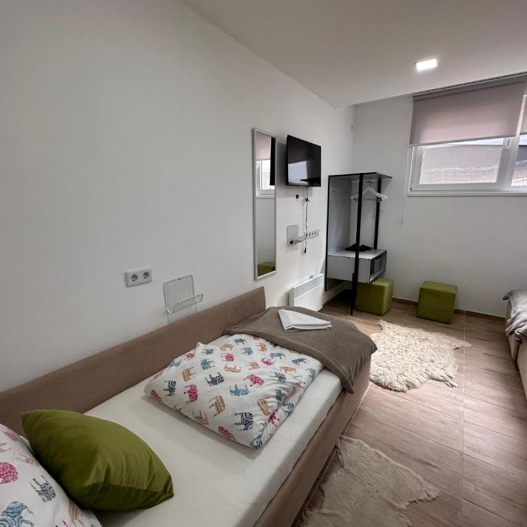 Ravne Energy Apartments - Trokrevetna Soba - 9