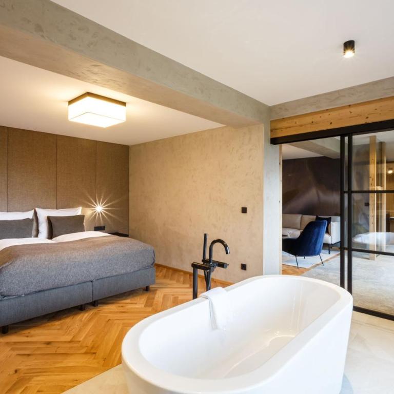 NOVA Moments Boutique Hotel - adults only - Suite mit Seeblick - 1