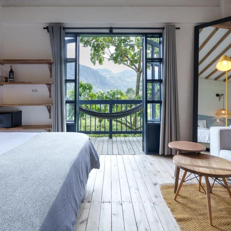 Hotel Plantación - Suite con cama grande y balcón - 5